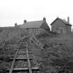 Cairne Fishing Lodge
View from SSE showing SE corner of rubble stores and NNW section of fishing railway's track