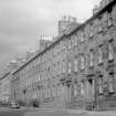 View of the East side of George Square, Edinburgh, including the buildings later demolished to make way for the William Robertson Building, seen from the South West.