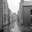 Stromness, Alfred Street, Cottages
General view from SW showing numbers 53 and 55 in distance