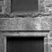 Detail of inscribed lintel above North East wing main entrance