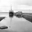 Sanday, Kettletoft Pier
View from WNW showing harbour light, SSW front of E half of slipway and NNE front of pier