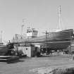 Scalloway, Westshore Harbour, Howarth's Boat Building Yard
View from NE showing boat on W half of yard