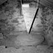 Westing, Horizontal Mill
Interior view of hopper and millstones, lightening beam to left