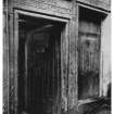 Detail of two doorways showing inscribed lintels (postcard, Knox Series)