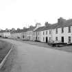 Islay, Port Charlotte
General view from N showing NE front of cottages on N tip of Main Street