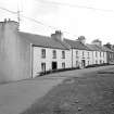 Islay, Port Charlotte
General view from N showing cottages on Main Street whose main entrances point WNW