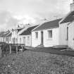 Islay, Portnahaven, 1-23 King Street, Terraced Cottages
General view from WSW showing NE front of numbers 11-18