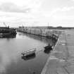 Gardenstown, Harbour
View from SE showing SW front of N pier and N tip of ESE front of S pier