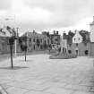 Beith, Eglinton Street, Terraced Houses and Shops
General view looking SSW showing E tip of Eglinton Street and numbers 24-26 Cross
