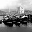 Kinlochbervie, Loch Bervie Harbour
View from SE showing boats docked at pier