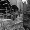 Peterculter, Kennerty Mills
View from SE showing part of S waterwheel with N waterwheel behind