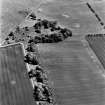 Greenfield, oblique aerial view, taken from the NNW, centred on the cropmarks of a settlement, and a linear cropmark.