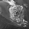 Scanned image of oblique aerial view, taken from the SE, centred on three coastal batteries.
