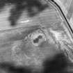 Morham Mains, oblique aerial view, taken from the NW, centred on the cropmarks of a settlement.