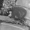 Preston Mill, oblique aerial view, taken from the SE, centred on cropmarks including a possible settlement. Preston Mill is visible in the centre of the photograph.