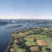 Oblique aerial view looking across Loch Lomond towards Ben Lomond and the Grampian Mountains, taken from the SE.
