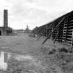 Ochiltree Tileworks
View from NNE showing ESE front of W drying sheds with rectangular downdraught kiln and chimney in background