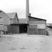 Keir House, Home Farm
View from ESE showing sawmill chimney with part of steading in foreground