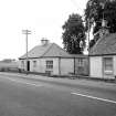 Elgin, Toll Cottage
View from NNW showing NE front of Toll Cottage with part of The Cottage in foreground