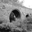 Dairsie Bridge
View from E showing plaque and NE front of N and central arches
