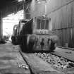 Glasgow, Clydebridge Steel Works, Interior
View showing disused Ruston 165 DE number 4 and remains of two NBL shunters, one 27420 of 1954