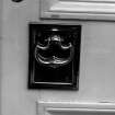 Edinburgh, 32 Heriot Row.
Detail of hinged bow-shaped door handle.