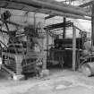 Dundee, Princes Street, Upper Dens Mills, Interior
View of fulling house showing coating stands and proofing machine, J. H. Riley and Company, Bury