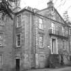 Spylaw House, Bridge Road, Colinton.
View from North East showing late eighteenth century North elevation, with curved double stair, and iron balcony at first floor level.