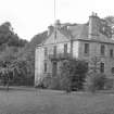 Spylaw House, Bridge Road, Colinton.
View from North West with family seated on bench to West of house.