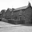 Hallside Steelworks, 1-28 Village Road, Terraced Houses
View from NE showing ESE front of numbers 11-16 and NNE front of number 11