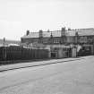 Hallside Steelworks, 1-28 Village Road, Terraced Houses
View from ENE showing ESE front of numbers 17-22 and NNE front of number 17