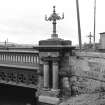 Glasgow, Dalmarnock Road, Dalmarnock Bridge
View from NE showing lamp-posts on N side and part of panelling and parapet