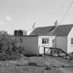 Lismore, Port Kilcheran, Limekilns
View from NW showing WSW front and part of NNW front of cottage