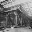 Ex-Scotland. Railway Bridge, New Buffalo River Bridge, East London, South Africa
View interior of Arrol's Glasgow Works, bridge box section under assembly.
Titled: 'South African Railways', 'New Buffalo River Bridge', 'East London', '3/155 0 Road and Rail spans', 'Ord[er] no. B5606', 'Ind no. 9M473', 'Contractors: Sir Wm Arrol & Co. Ltd., Glasgow', 'May 1933'.
Stamped verso: 'The Dux Engraving Co Ltd, Glasgow', '[Negative no.] 1889/2'.