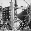 Ex-Scotland.  Barrage, Swing Bridge and Lock Gates.  Nag Hammadi Barrage, Upper Nile, Egypt
View of lock under construction, with pair of gates in foreground.
Titled: 'Gates in the lock, N.H.B. No. 327'.
Insc verso: 'Photo no.4', 'Nag Hammadi', 'Upstream Lock Gates showing mitre posts erected on 30 March [19]29'.
Stamped verso: 'Copyright of Sir John Jackson Ltd., no infringement permitted'.
Dated verso: '31 March 1929'.