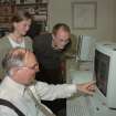 RCAHMS AT WORK.
John Stevenson demonstrating software in the Survey and Graphics Department.