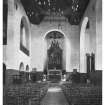 St Peter's Church, interior.
Photographic copy of postcard showing view towards alter.