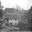 Currie, Bridgend, Thatched Cottage.
View from North with Currie Kirk in distance.