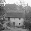 Currie, Bridgend, Thatched Cottage.
View from North with Currie Kirk in distance.