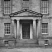 Edinburgh, Frogston Road East, Morton Hall House.
Detail of main doorway, a simple pediment resting on fluted columns.