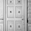 Edinburgh, Frogston Road East, Mortonhall, interior.
View of first floor principal drawing room door. Six panels with painted vignettes and scrolling decoration.
