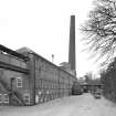 Dalmore Paper Mills, view of finishing house and paper sorting department, with chimney in background.