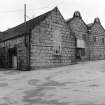 Oldmeldrum, Distillery Road, Glengarioch Distillery
View from WNW showing WSW front and part of NNW front of cooperage and WSW front of Duty Free Warehouse Number 5