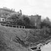 Kirkintilloch, Electricity Substation
View from N showing NNE and WNW fronts of substation with tenement and shop in background