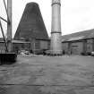 Alloa, Glasshouse Loan, Alloa Glassworks
View from SE showing glass cone with part of anullary building and base of chimney in foreground