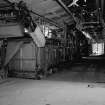 Huntingtowerfield, Bleach and Dye Works, Interior
View looking N in mineral khaki department showing 8 tank open-soaper 44'' WD (went along centre of building)