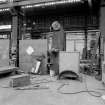 Paisley, MacDowall Street, Caledonia Engineering Works, Interior
View of boiler shop looking W showing back end of Tweddells System, Fielding and Platt limited Gloucester, hydraulic plate bending machine