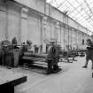 Paisley, MacDowall Street, Caledonia Engineering Works, Interior
View of boiler shop looking SE showing roll bending and straightening machine which is made by Craig and Donald (number 125,07)