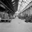 Paisley, MacDowall Street, Caledonia Engineering Works, Interior
View looking N in E bay of boilershop with roll bending and straightening machine made by Craig and Donald (number 125,07) and box table on left foreground