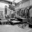 Paisley, MacDowall Street, Caledonia Engineering Works, Interior
View of boiler shop looking NE showing hydraulic beam bending machine with access ladder to overhead crane in background